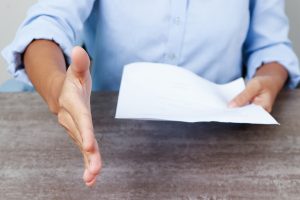Closeup of person offering hand for handshake