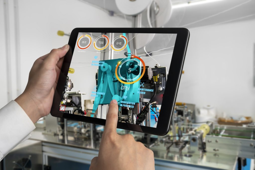 Engineer use augmented reality software in smart factory production line