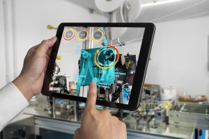 Engineer use augmented reality software in smart factory production line